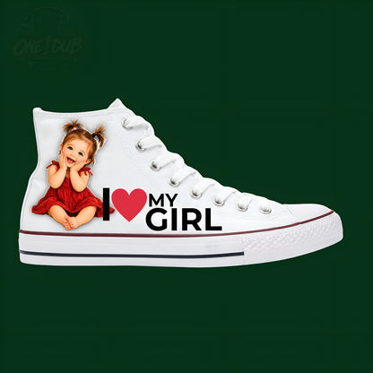 White high-top sneaker with a graphic of a child in a red dress and 'I ❤️ MY GIRL' text on a green background.