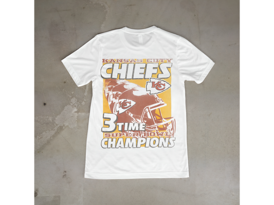 WHITE T-SHIRT KANSAS CITY CHAMPIONS WROTE ON IT.